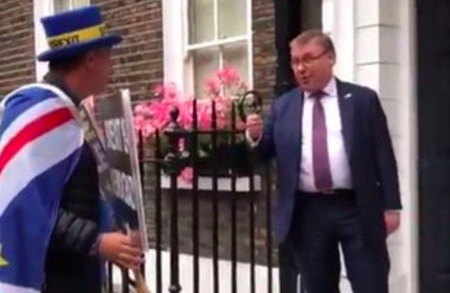 Mark Francois (right) told anti-Brexit protestor Steve Bray he would be 'signing his death warrant'