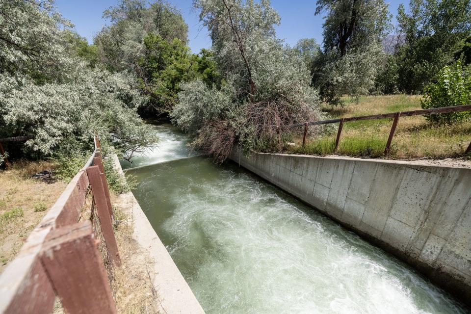 Water runs down Little Cottonwood Creek at Wheeler Historic Farm in Murray. Salt Lake County Mayor Jenny Wilson and County Flood Control Director Kade Moncur held a press conference on Monday, announcing the end of the flooding emergency declared by Wilson in April.