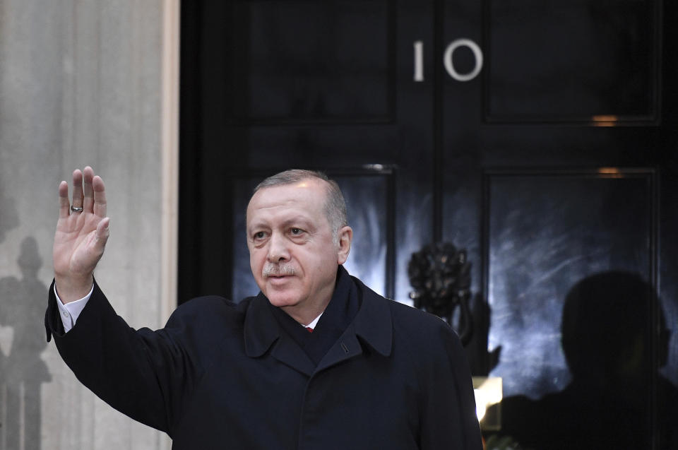 Turkey's President Recep Tayyip Erdogan arrives 10 Downing Street, ahead of the NATO summit, in London, Tuesday, Dec. 3, 2019. U.S. President Donald Trump and his NATO counterparts were gathering in London Tuesday to mark the alliance's 70th birthday amid deep tensions as spats between leaders expose a lack of unity that risks undermining military organization's credibility. (Daniel Leal-Olivas/Pool Photo via AP)