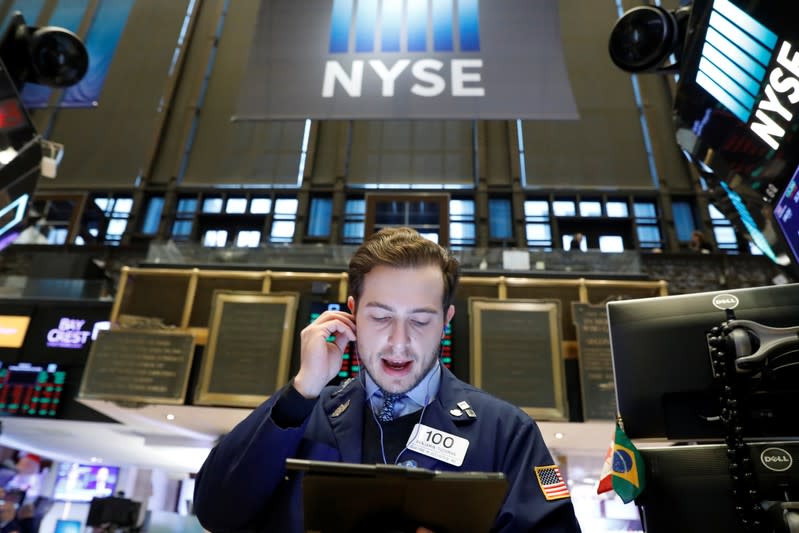 A trader works on the floor at the NYSE in New York