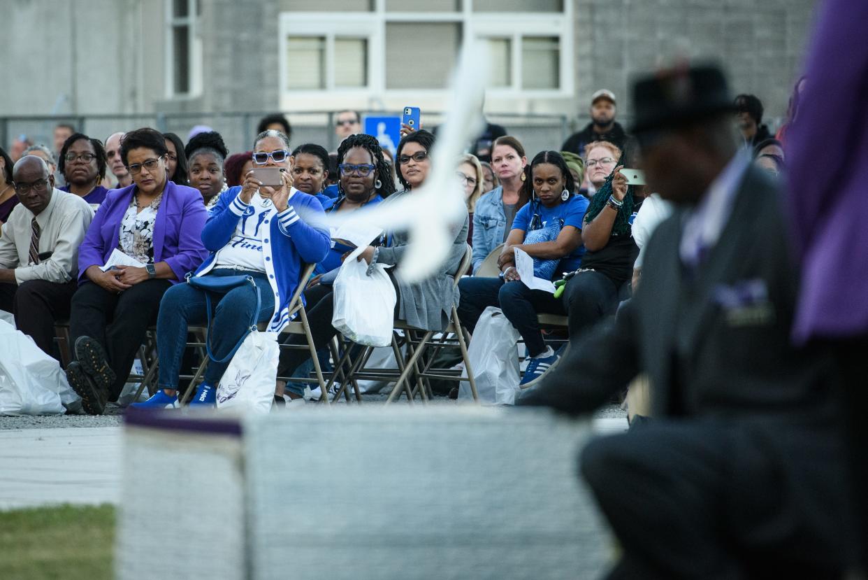 Doves are released at the Remember My Name domestic violence vigil at Festival Park on Thursday, Oct. 6, 2022.