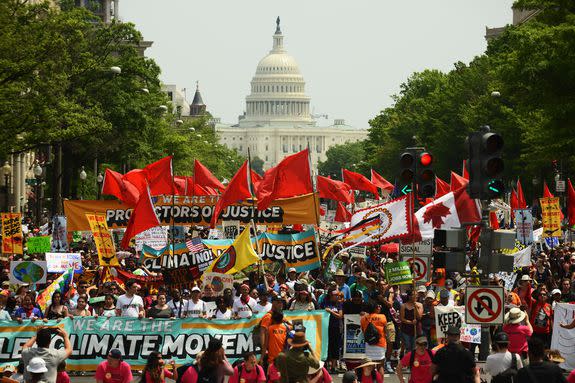 People march from the U.S. Capitol to the White House for the People's Climate Movement on April 29, 2017 in Washington, DC.