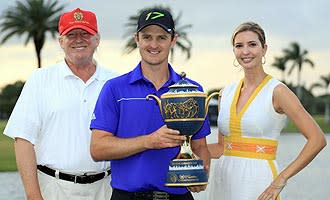 Donald Trump and daughter Ivanka pose with Cadillac Championship winner Justin Rose