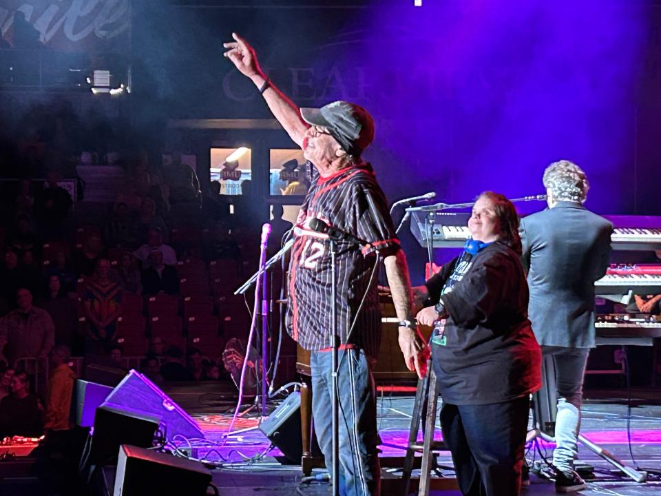 Donnie Iris waves hello to fans at UPMC Events Center.