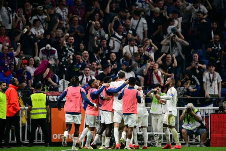 Lyon celebrate after scoring a goal during their dramatic 4-3 home win against <a class="link " href="https://sports.yahoo.com/soccer/teams/stade-brest-29/" data-i13n="sec:content-canvas;subsec:anchor_text;elm:context_link" data-ylk="slk:Brest;sec:content-canvas;subsec:anchor_text;elm:context_link;itc:0">Brest</a> (OLIVIER CHASSIGNOLE)