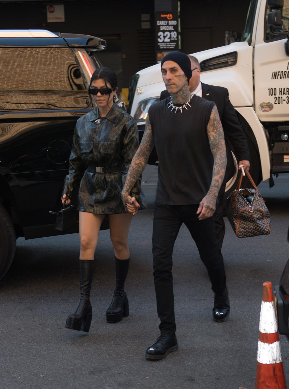 Kourtney Kardashian and Travis Barker arrive in New York City. - Credit: BeautifulSignatureIG / SplashNews.com