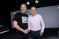 Finnish game company Supercell Co-Founder and CEO Ilkka Paananen (L) and Martin Lau, President of Tencent, pose while meeting with the press in the company's headquarters in Helsinki, Finland June 21, 2016. Lehtikuva/Seppo Samuli/via REUTERS