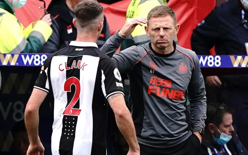 Graeme Jones chats with Ciaran Clark - PA