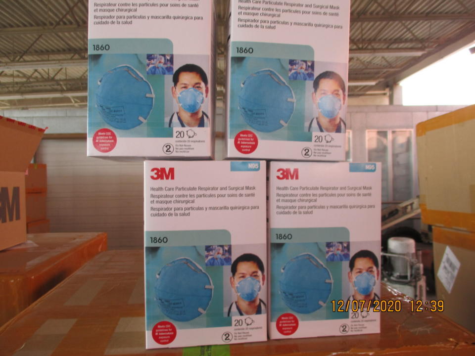 This December 2020 image provided by U.S. Immigration and Customs Enforcement (ICE) shows counterfeit N95 surgical masks that were seized by ICE and U.S. Customs and Border Protection. Federal investigators are probing a massive counterfeit N95 mask operation sold in at least five states to hospitals, medical facilities, and government agencies and expect the number to rise significantly in coming weeks. The fake 3M masks are at best a copyright violations and at worst unsafe fakes that put unknowing health care workers at grave risk for coronavirus. And they are becoming increasingly difficult to spot. (ICE via AP)