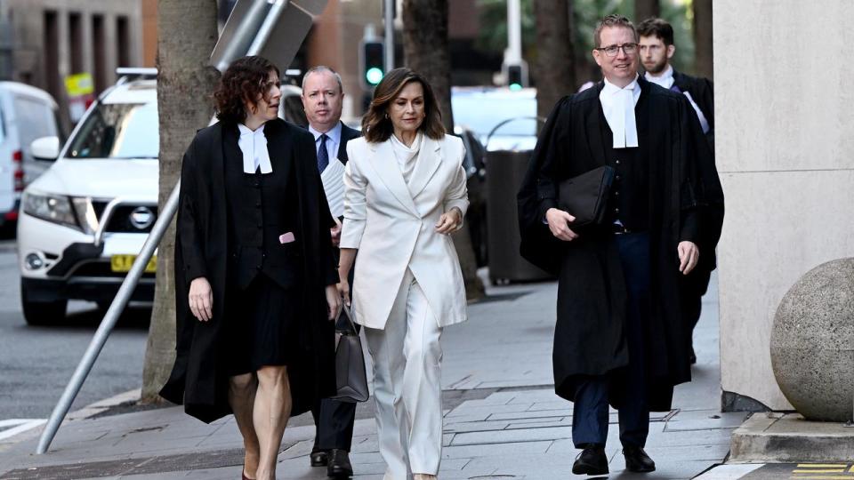 Lisa Wilkinson and her lawyers (file image)