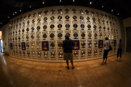 Patrons visit the Country Music Hall of Fame in downtown Nashville, Tennessee June 19, 2013. REUTERS/Harrison McClary