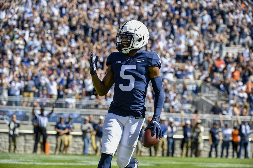 FILE - Penn State wide receiver Jahan Dotson (5) celebrates his first quarter touchdown catch against Villanova during an NCAA college football game in State College, Pa., in this Saturday, Sept. 25, 2021, file photo. The key matchup in fourth-ranked Penn State's showdown with No. 3 Iowa pits the Nittany Lions' passing combo of Sean Clifford and Jahan Dotson against a defense that leads the nation with 12 interceptions. (AP Photo/Barry Reeger, File)