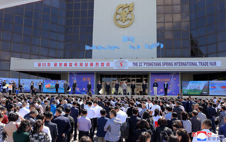 People attend the 22nd Pyongyang Spring International Trade Fair, in Pyongyang, North Korea May 20, 2019. KCNA via REUTERS