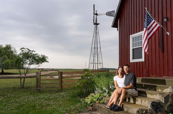 PHOTO: Adrienne and Justin Barnes at their home near Williamsport. They and the extended Barnes family are against the proposed Chipmunk solar project and are helping to lead a campaign against it. (Eric Albrecht)