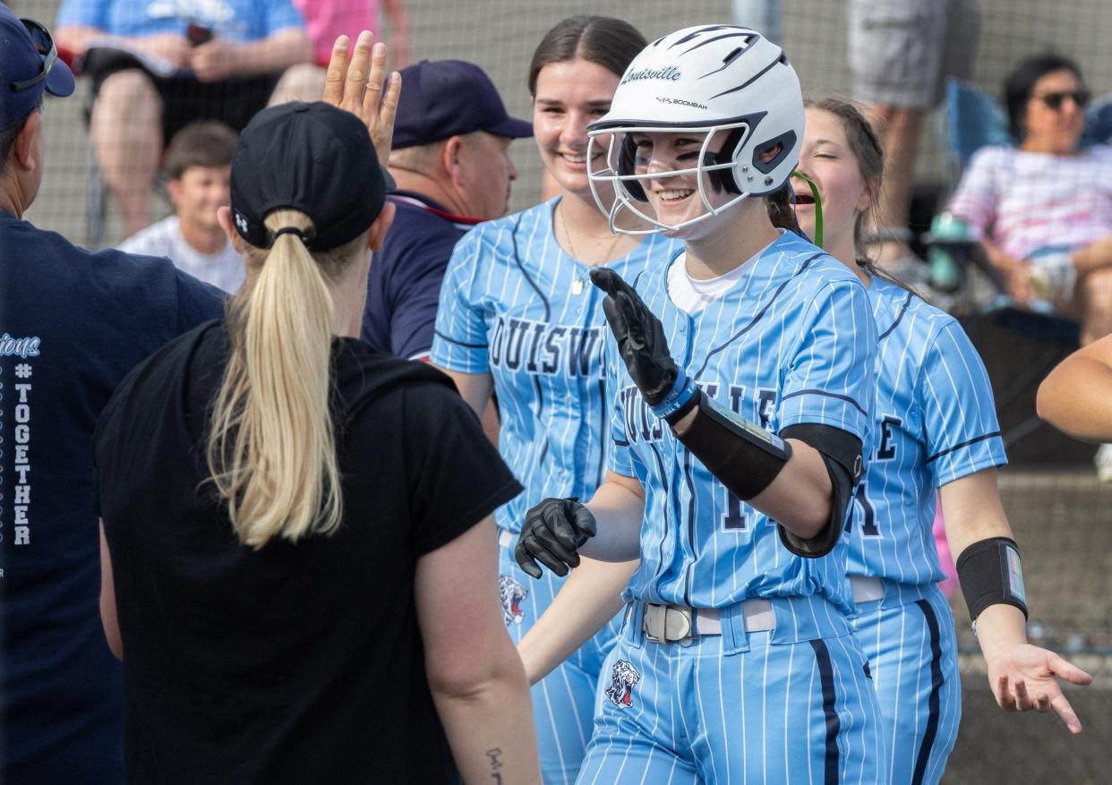 Louisville’s Leah Claugus celebrates her home run against Nordonia on Wednesday, May 8, 2024.