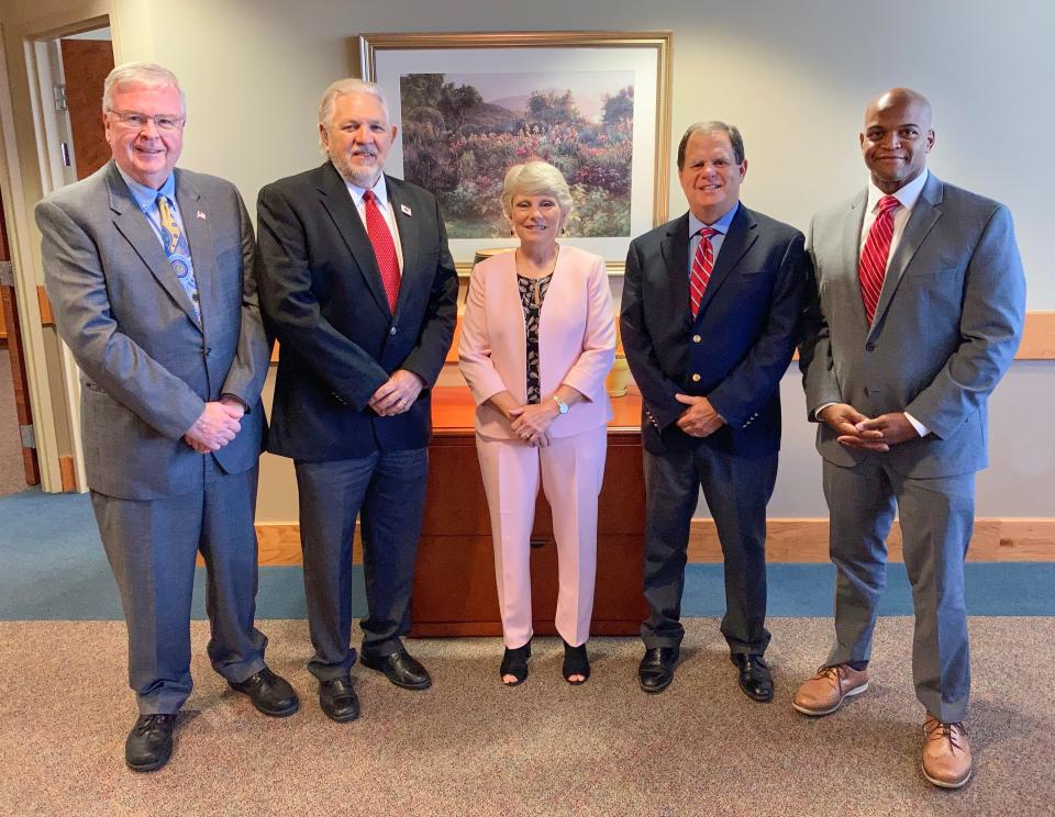Pictured from left are former Cardinal Foundation presidents Brian Snell and Steve Hildebrant, Gadsden State President Dr. Kathy Murphy, current Cardinal Foundation President Mark Condra and the next Cardinal Foundation President, Tommie Goggans III.