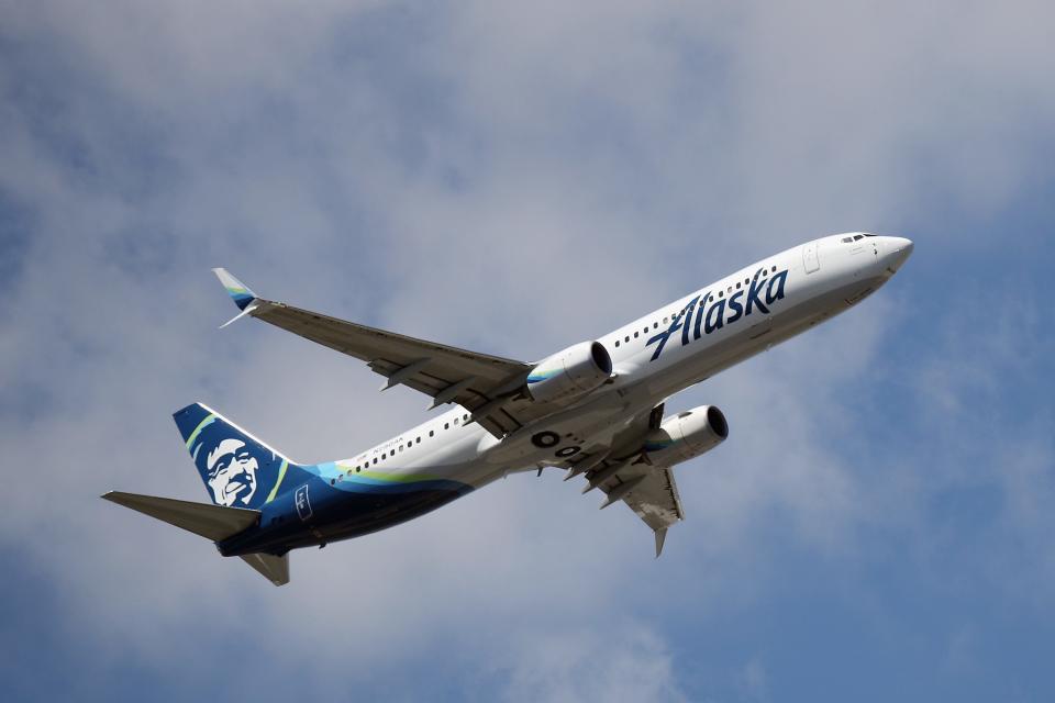 A Boeing 737-990 (ER) operated by Alaska Airlines takes off from JFK Airport on August 24, 2019 in the Queens borough of New York City.