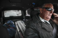 Funeral director Tom Cheeseman talks on the phone after making a house call to collect a body for transfer to a mortuary, Friday, April 3, 2020, in the Brooklyn borough of New York. “We took a sworn oath to protect the dead, this is what we do,” he said. “We’re the last responders. Our job is just as important as the first responders." (AP Photo/John Minchillo)