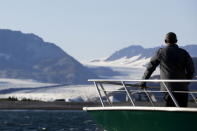 U.S. President Barack Obama views Bear Glacier on a boat tour of Kenai Fjords National Park in Seward, Alaska September 1, 2015. REUTERS/Jonathan Ernst