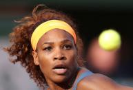 FILE PHOTO: Williams of the U.S. eyes the ball during her women's singles semi-final match against Errani of Italy at the French Open tennis tournament in Paris