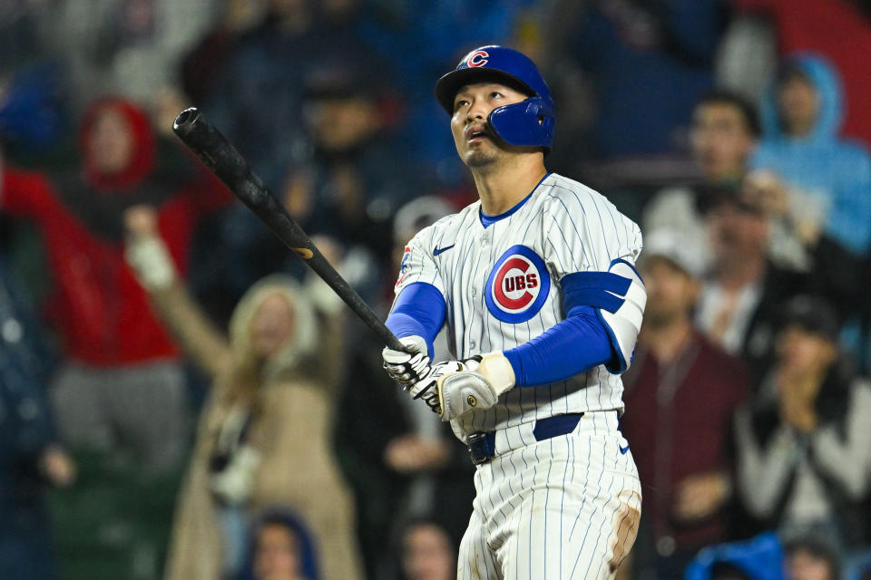 CHICAGO, ILLINOIS - JUNE 01: Seiya Suzuki #27 of the Chicago Cubs hits a grand slam in the second inning against the Cincinnati Reds at Wrigley Field on June 01, 2024 in Chicago, Illinois. (Photo by Quinn Harris/Getty Images)