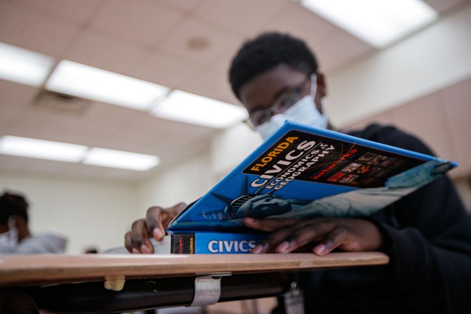 Travis Williams works on a civics packet in a new pilot program at Nims Middle School the helps overage fifth graders students speed through sixth grade and catch up to their peers Thursday, Jan. 20, 2022.