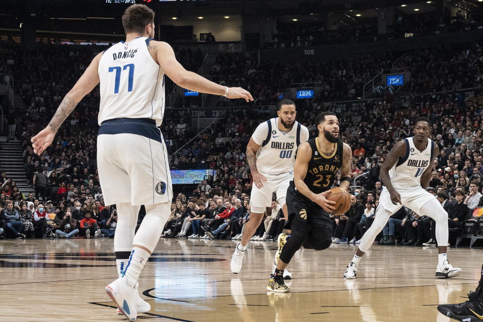 Toronto Raptors' Fred VanVleet drives through the Dallas Mavericks defense during first-half NBA basketball game action in Toronto, Saturday, Nov. 26, 2022. (Chris Young/The Canadian Press via AP)