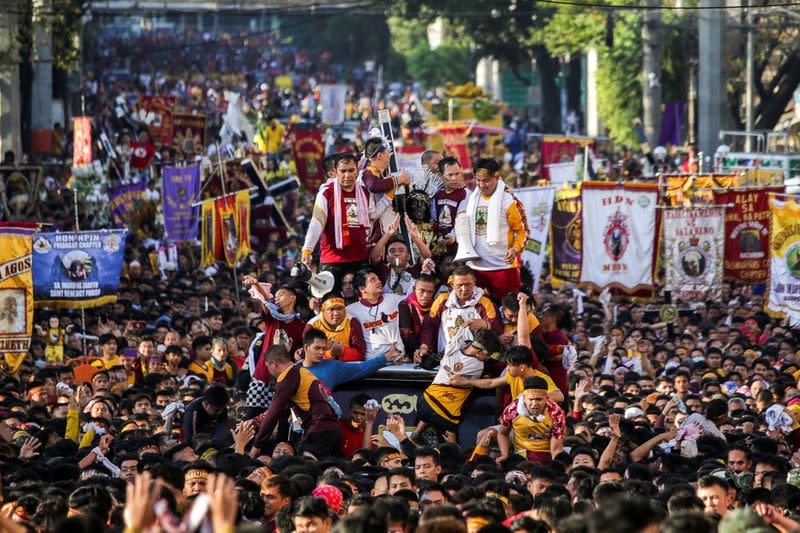 Filipino devotees join the annual Catholic procession of the Black Nazarene