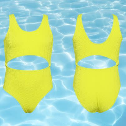 A neon yellow cut-out one-piece