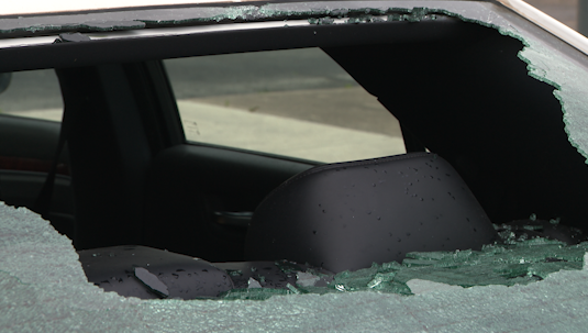 One of many vehicles that lost its back windshield (Photo Courtesy: KXAN).