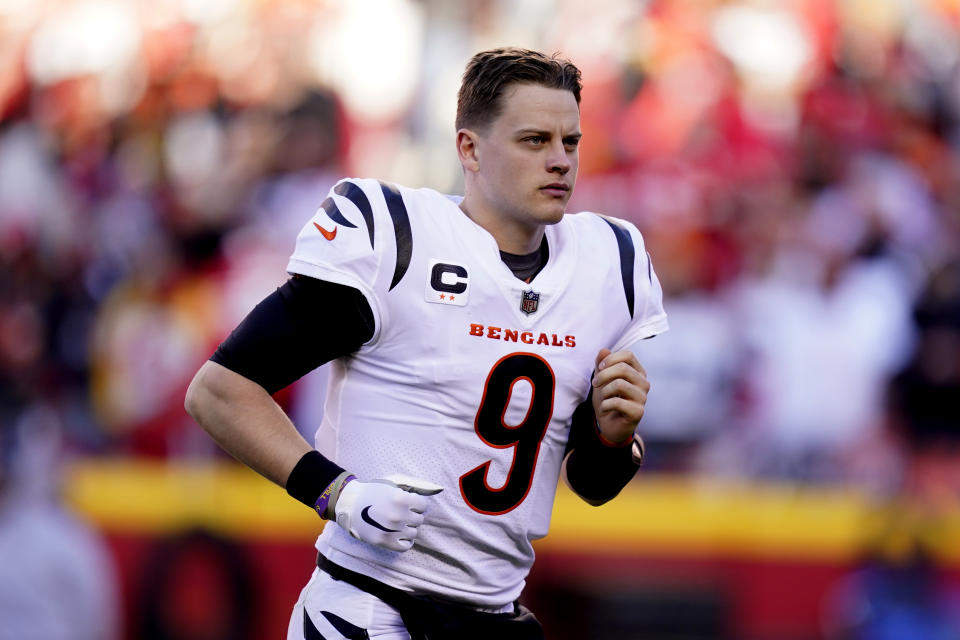 Cincinnati Bengals quarterback Joe Burrow (9) runs off the field at halftime of the AFC championship NFL football game against the Kansas City Chiefs, Sunday, Jan. 30, 2022, in Kansas City, Mo. (AP Photo/Ed Zurga)