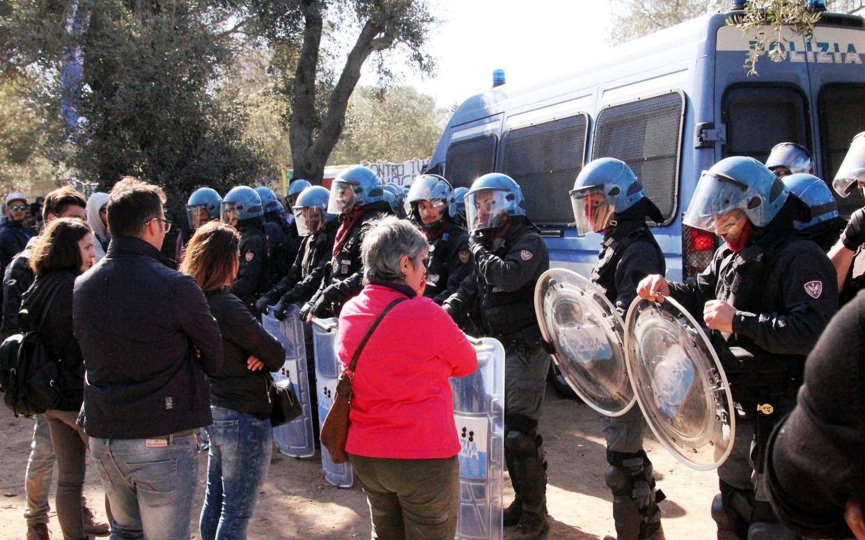 A standoff between protesters and police at the pipeline construction site in Puglia in southern Italy - Splash News