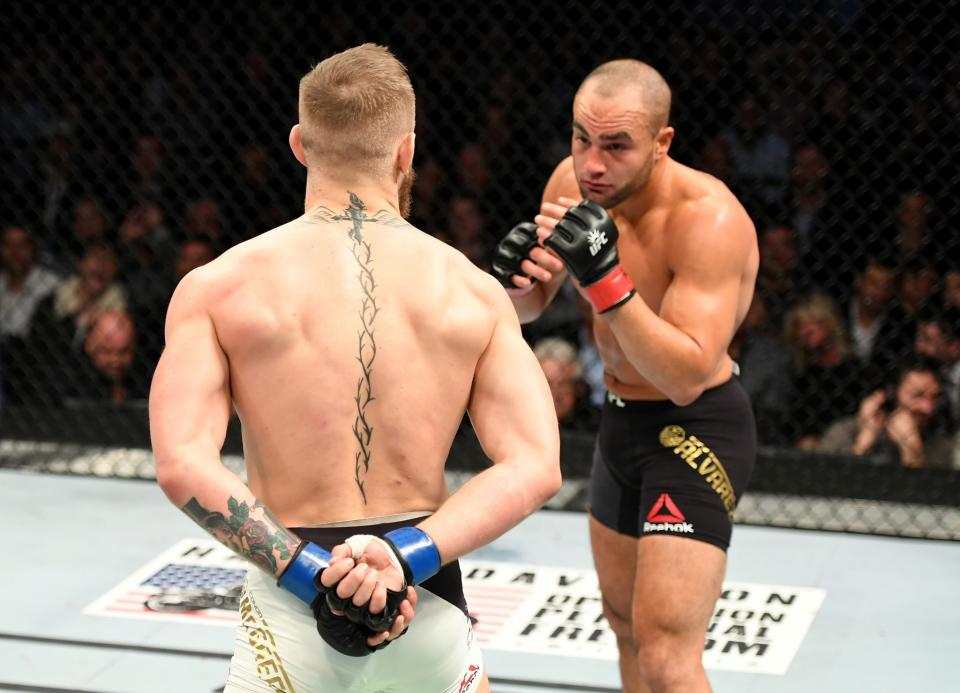 <p>Eddie Alvarez of the United States (right) fights against Conor McGregor of Ireland in their lightweight championship bout during the UFC 205 event at Madison Square Garden on November 12, 2016 in New York City. (Photo by Jeff Bottari/Zuffa LLC/Zuffa LLC via Getty Images) </p>