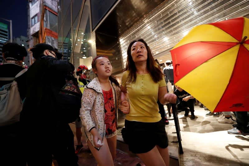 Hong Kong police fire tear gas in feverish start to 22nd weekend of protests in Hong Kong