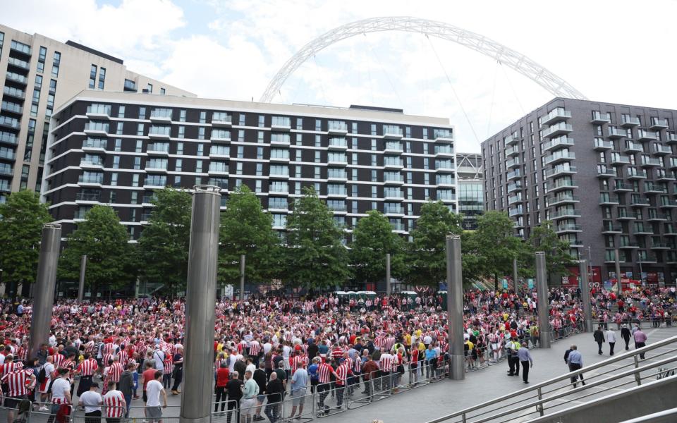 Sunderland fans are seen outside the stadium ahead of the Sky Bet League One Play-Off Final match between Sunderland and Wycombe Wanderers at Wembley  - GETTY IMAGES