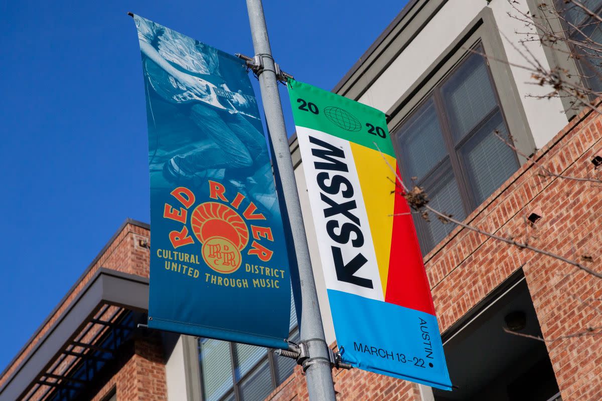 SXSW 2020 banners are seen in the Red River Cultural District on March 6, 2020 in Austin Texas.