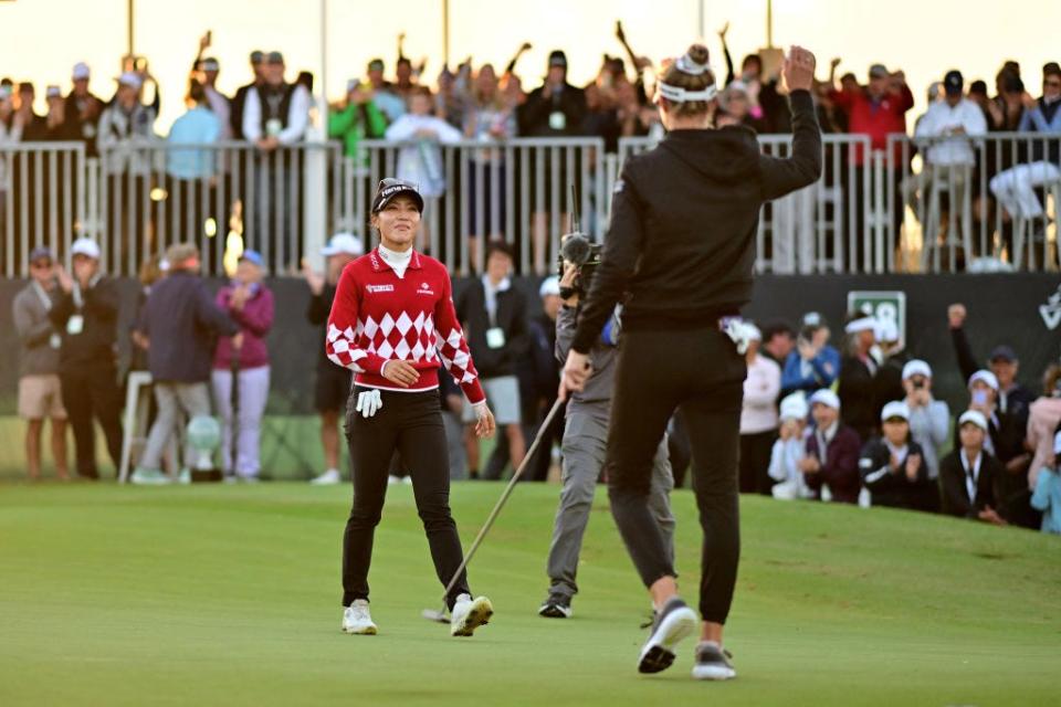 Lydia Ko, left, looks on, after Nelly Korda, right, defeated her in a playoff Sunday at the LPGA Drive On Championship.