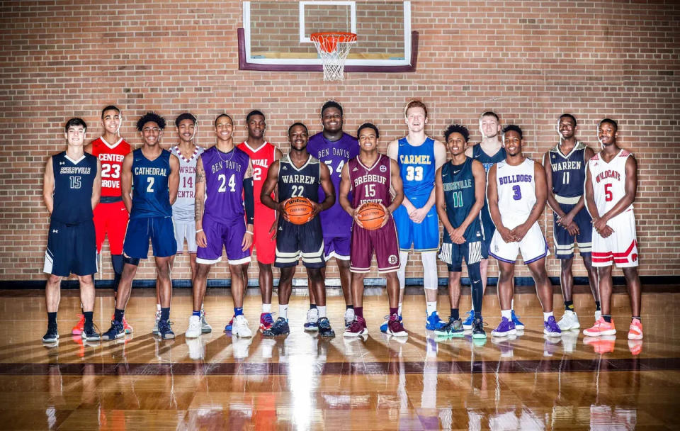 The 2018 IndyStar boys basketball Super Team, which included two future Cleveland Browns draft picks in Warren Central's David Bell (22, holding basketball) and Ben Davis' Dawand Jones (54).