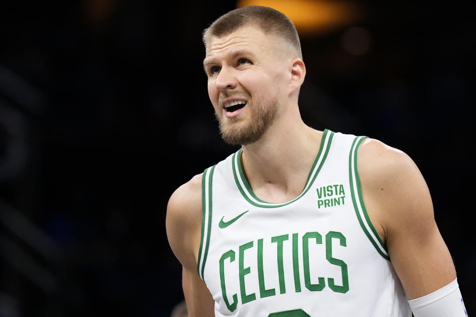 ORLANDO, FLORIDA - NOVEMBER 24: Kristaps Porzingis #8 of the Boston Celtics looks on against the Orlando Magic during the first half at Amway Center on November 24, 2023 in Orlando, Florida. User expressly acknowledges and agrees that, by downloading and/or using this Photograph, user is consenting to the terms and conditions of the Getty Images License Agreement. (Photo by Rich Storry/Getty Images)