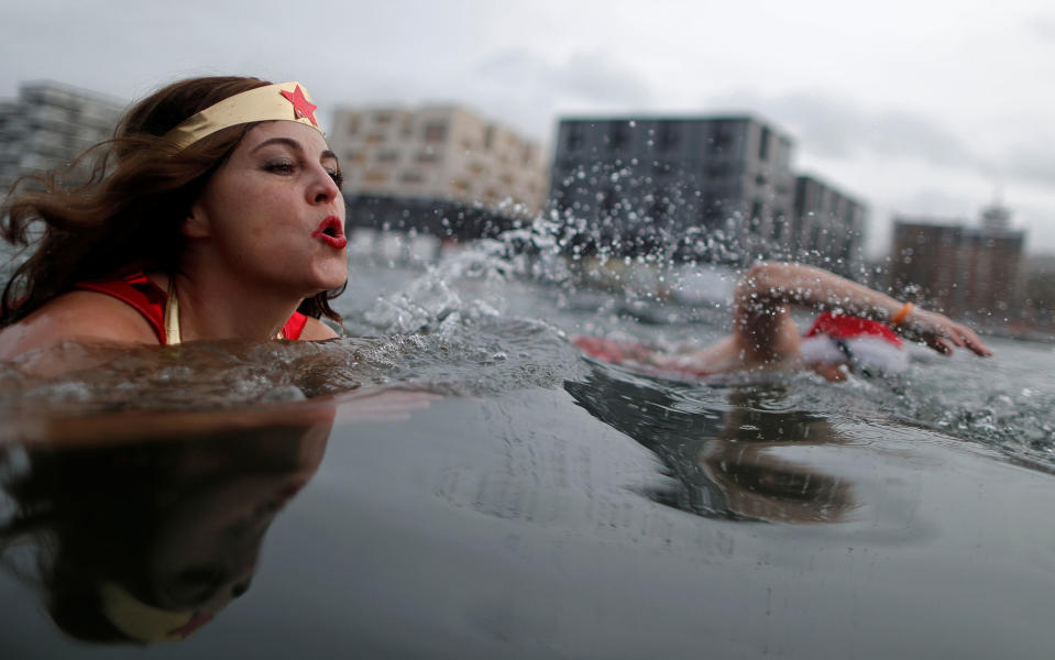 A winter swimmer enjoys a Christmas bath in Pantin, France