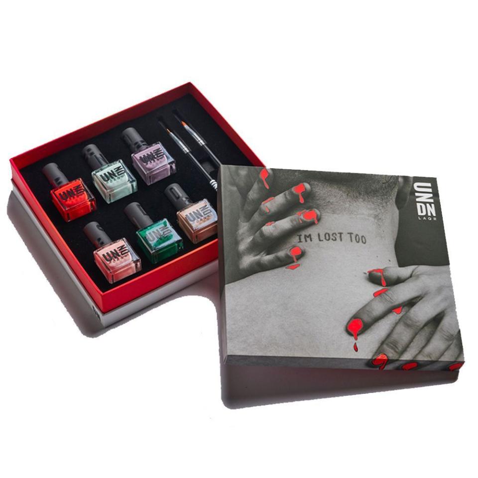 <p><a href="https://go.redirectingat.com?id=74968X1596630&url=https%3A%2F%2Fundnlaqr.com%2Fcollections%2Fnail-polish-sets-kits%2Fproducts%2Ftherapy-sessions-kit&sref=https%3A%2F%2Fwww.cosmopolitan.com%2Fstyle-beauty%2Fbeauty%2Fa38387147%2Fmachine-gun-kelly-nail-polish-undn-laqr-2021%2F" rel="nofollow noopener" target="_blank" data-ylk="slk:Shop Now;elm:context_link;itc:0;sec:content-canvas" class="link ">Shop Now</a></p><p>Therapy Sessions Kit</p><p>$84.00</p><p>undnlaqr.com</p><span class="copyright">Courtesy Image</span>