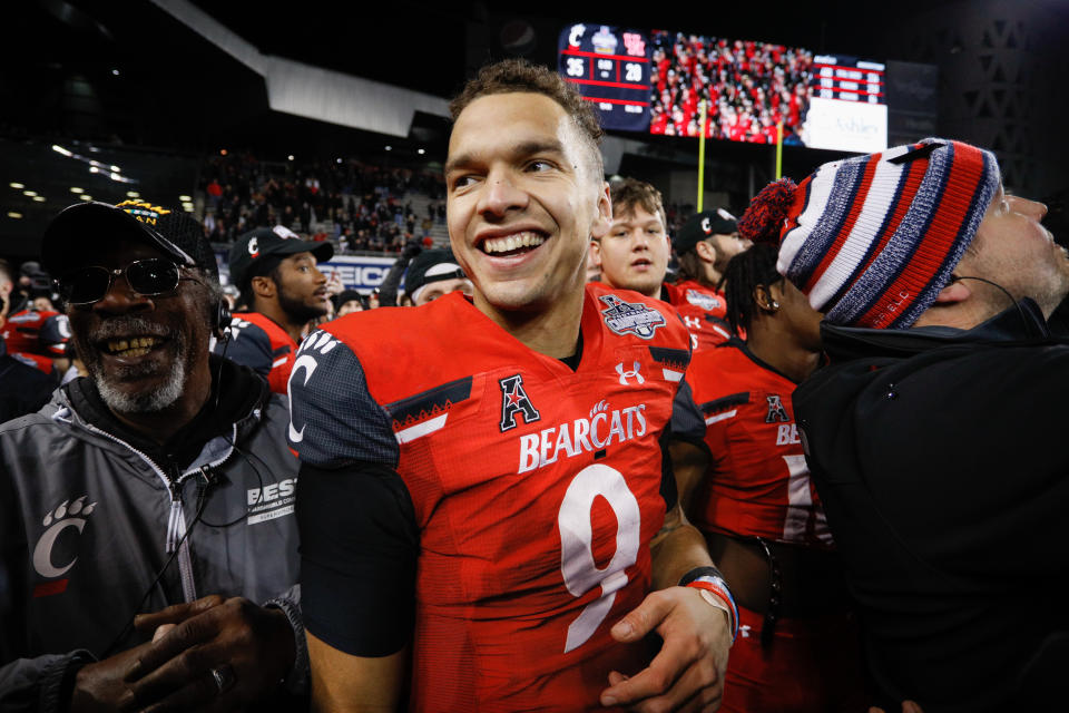 CINCINNATI, OH - DECEMBER 04: Cincinnati Bearcats quarterback Desmond Ridder (9) reacts after winning the AAC Championship game against the Houston Cougars and the Cincinnati Bearcats on December 4, 2021, at Nippert Stadium in Cincinnati, OH. (Photo by Ian Johnson/Icon Sportswire via Getty Images)