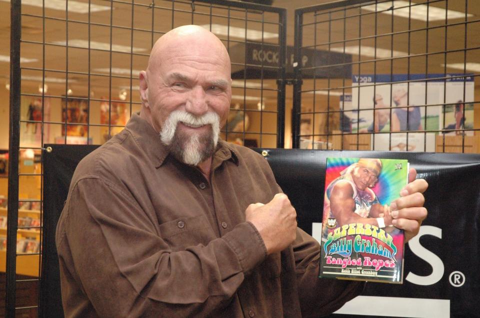 superstar billy graham signs his book 