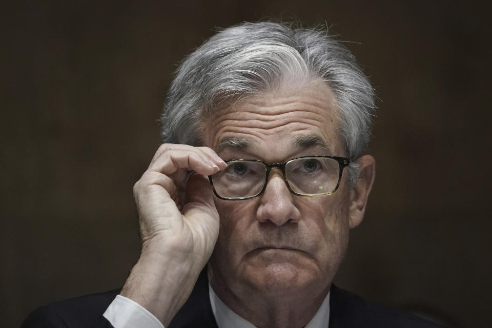 FILE - In this Thursday Sept. 24, 2020 file photo, Federal Reserve Board Chairman Jerome Powell testifies during a Senate Banking Committee hearing, on Capitol Hill in Washington. Three of the globe's top central banks said on Thursday, Nov, 12 the world economy continues to need help despite news of progress toward a COVID-19 vaccine, with U.S. Federal Reserve Chair Jerome Powell saying that the U.S. Congress “may have to do more” to cushion the blow from the pandemic. (Drew Angerer/Pool via AP, file)