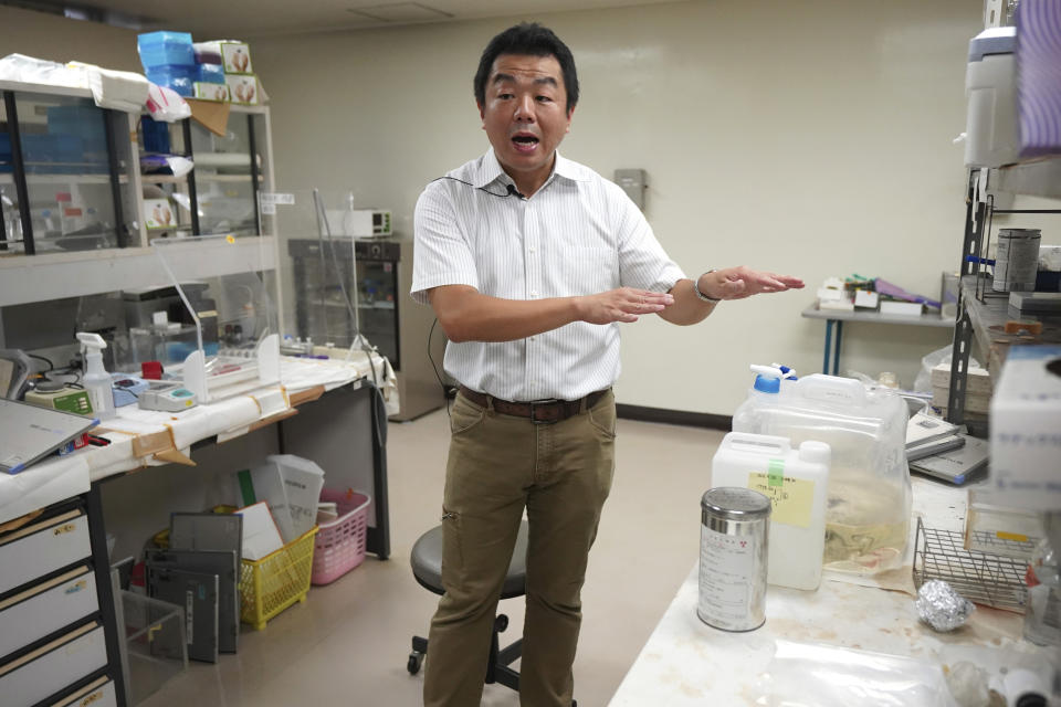 Katsumi Shozugawa, assistant professor at Graduate School of Arts and Sciences of the University of Tokyo, speaks with the Associated Press during an interview Wednesday, July 19, 2023, in Tokyo. Shozugawa said radioactivity of the treated water is so low that once it hits the ocean it will quickly disperse and become almost undetectable, which makes pre-release sampling of the water important for data analysis. (AP Photo/Eugene Hoshiko)