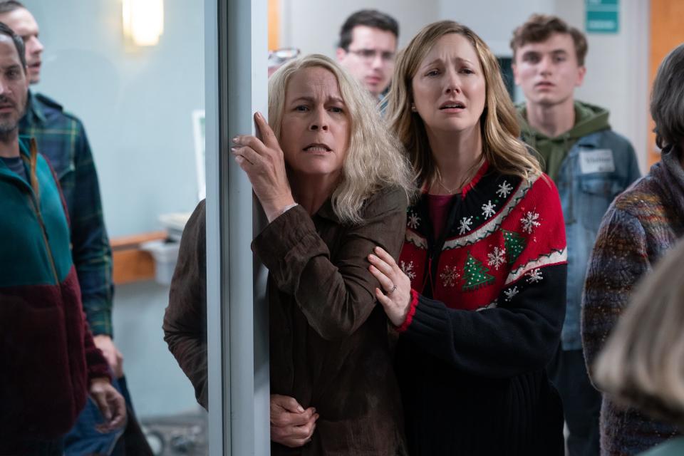 Laurie Strode (Jamie Lee Curtis, left) and daughter Karen (Judy Greer) are left reeling after their last run-in with Michael Myers in the sequel "Halloween Kills."