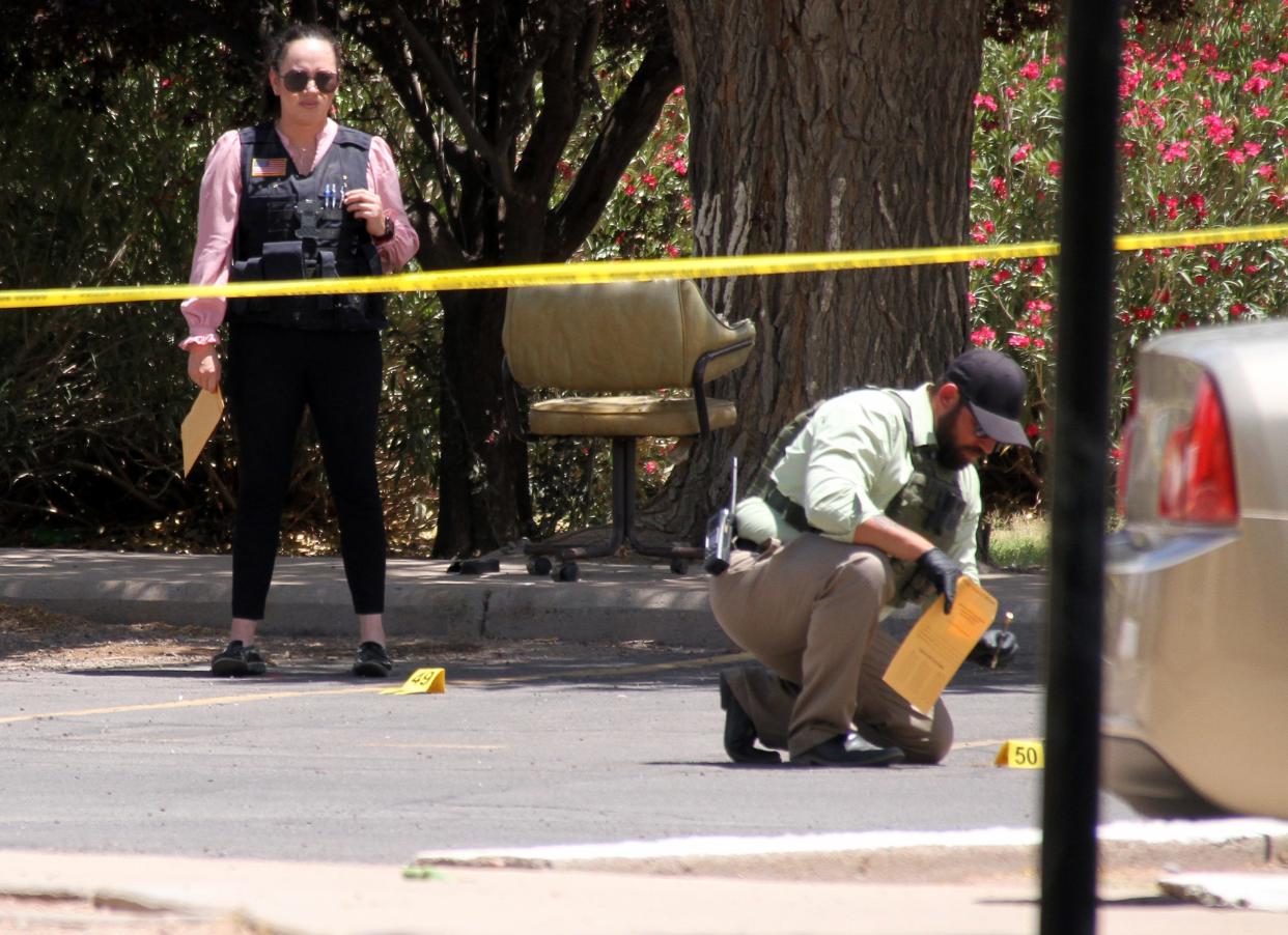 Deming police investigators collected evidence from Monday's crime scene at the Deming Manor Apartments (1000 S. Zinc St.).