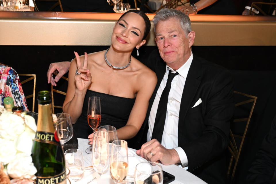 BEVERLY HILLS, CALIFORNIA - JANUARY 07: (L-R) Katharine McPhee and David Foster enjoy Moët & Chandon at 81st Annual Golden Globes, celebrating 13 years of Toast for a Cause at the Beverly Hilton on January 7, 2023. (Photo by Michael Kovac/Getty Images for Moët & Chandon)