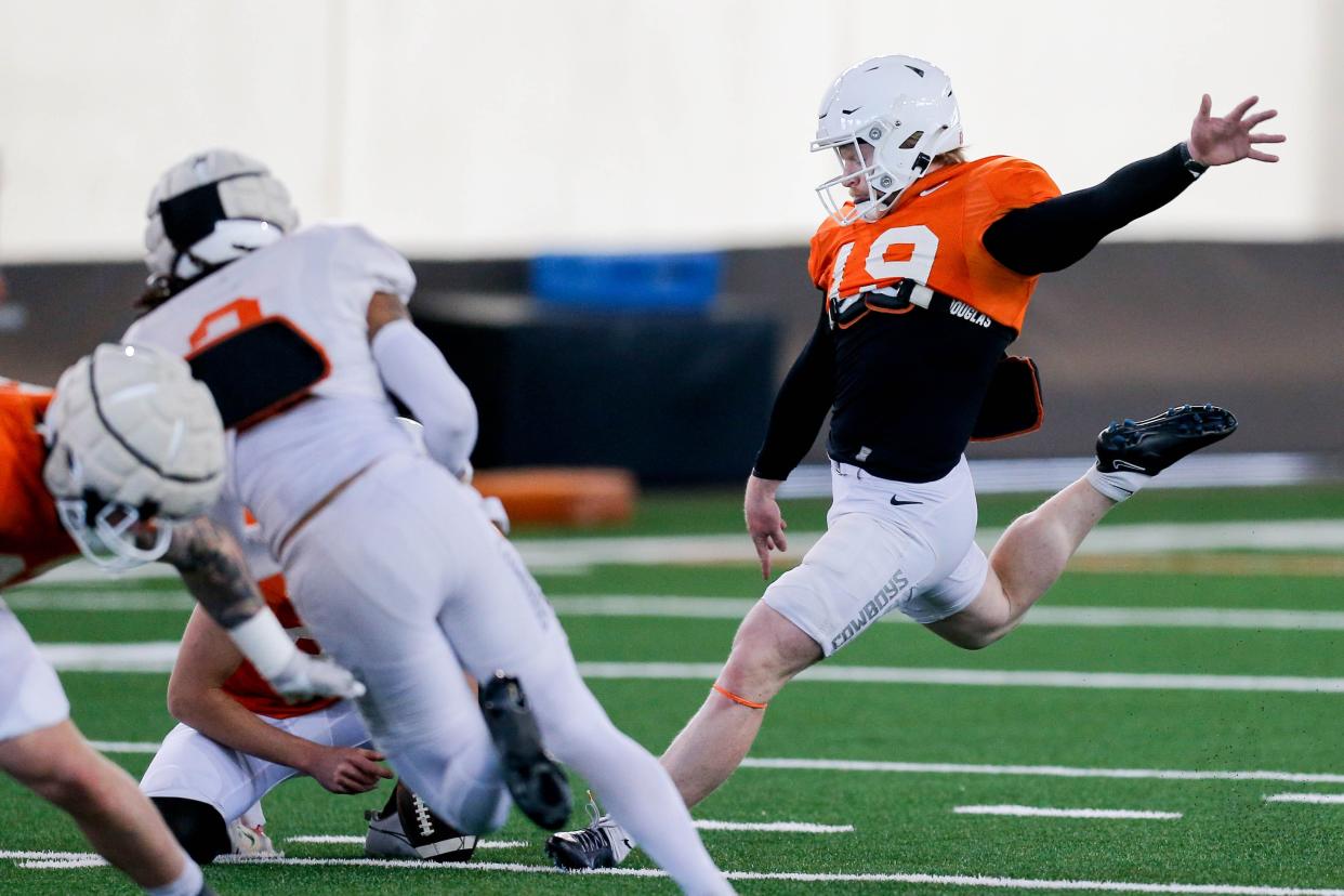 Logan Ward (19) runs drills during a Oklahoma State football practice, in Stillwater, Okla., on Tuesday, April 2, 2024.