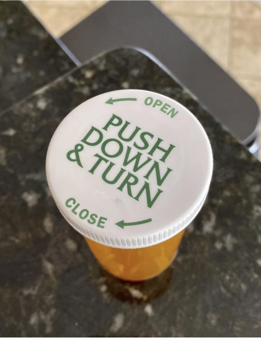 "Push down and turn"